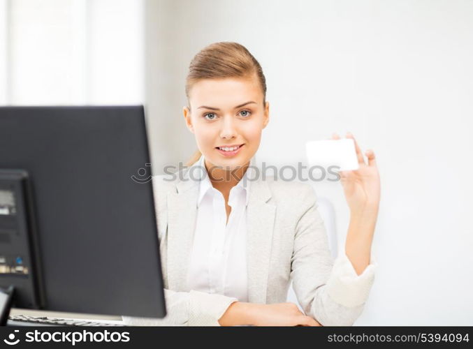 smiling and confident woman with blank business card