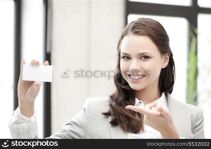 smiling and confident woman with blank business card