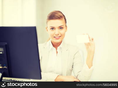 smiling and confident woman with blank business card