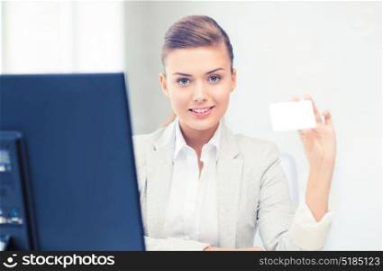 smiling and confident woman with blank business card. woman with blank business card