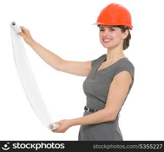 Smiling architect woman with open flip chart. HQ photo. Not oversharpened. Not oversaturated. Smiling architect woman with open flip chart isolated