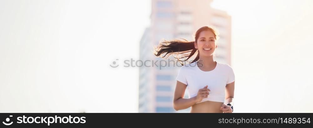 smiling Asian Young fitness sport woman running and Sportive people training in a urban area, healthy lifestyle and sport concepts
