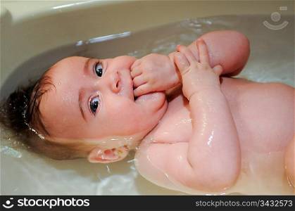 Smiling baby in the bath