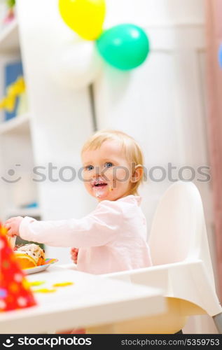 Smiling baby on first birthday celebration