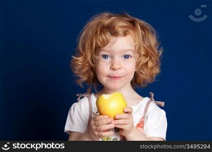 Smiling beautiful child eating apple