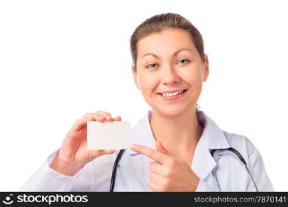 Smiling beautiful doctor showing business card studio shot