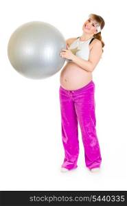 Smiling beautiful pregnant female in sportswear holding fitness ball isolated on white &#xA;