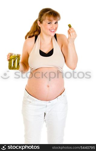 Smiling beautiful pregnant woman eating pickles isolated on white&#xA;