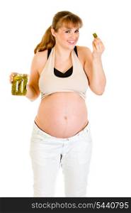 Smiling beautiful pregnant woman eating pickles isolated on white&#xA;