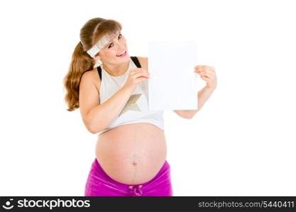 Smiling beautiful pregnant woman holding empty white paper over her head isolated on white&#xA;