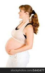 Smiling beautiful pregnant woman holding her belly isolated on white background&#xA;