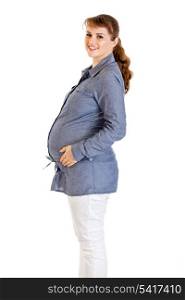 Smiling beautiful pregnant woman holding her tummy isolated on white background&#xA;