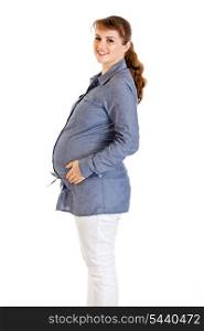 Smiling beautiful pregnant woman holding her tummy isolated on white background&#xA;