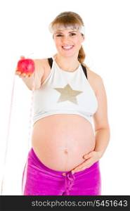 Smiling beautiful pregnant woman holding measure tape and apple isolated on white&#xA;