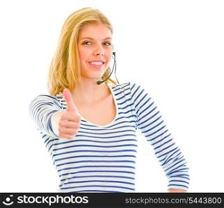 Smiling beautiful teen girl in headset showing thumbs up&#xA;