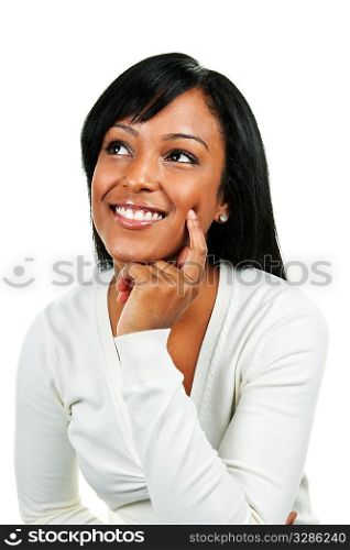 Smiling black woman looking up isolated on white background