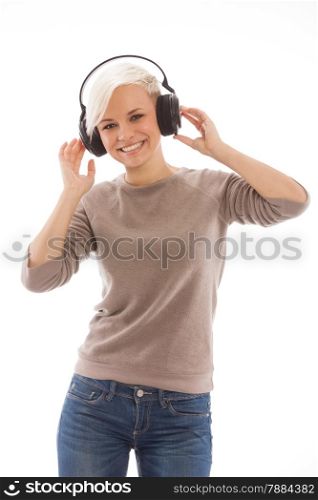 Smiling blonde woman with headphones is shaking over white isolated background