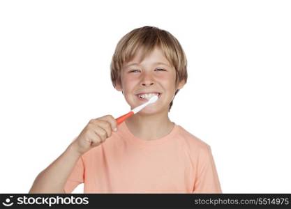 Smiling boy brushing his teeth isolated on white background
