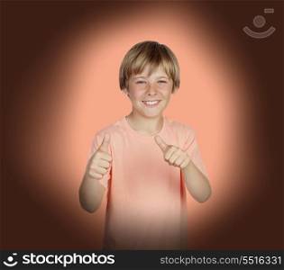 Smiling boy saying Ok on a over white background