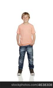 Smiling boy with jeans standing isolated on white background