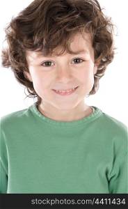 Smiling boy with six years old looking at camera isolated on a white background