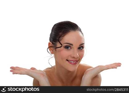 Smiling brown-haired woman on white background