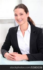 Smiling brunette businesswoman