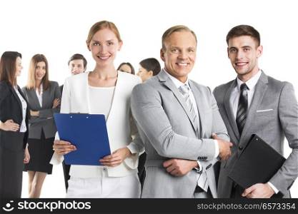Smiling business leaders. Smiling business leaders and their team isolated on white background