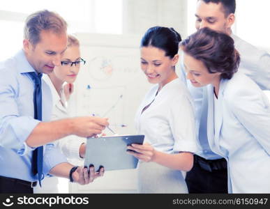 smiling business team discussing something in office. business team discussing something in office