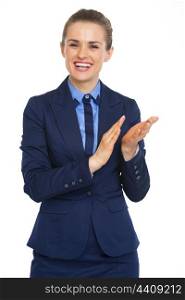 Smiling business woman clapping