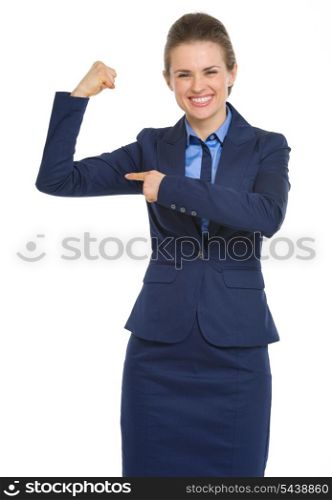Smiling business woman pointing on biceps