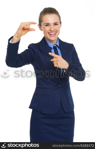 Smiling business woman pointing on small risks