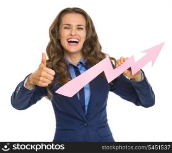 Smiling business woman showing graph arrow going up and thumbs up