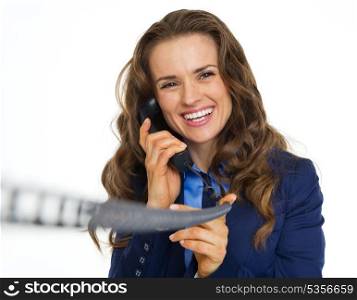 Smiling business woman talking on phone