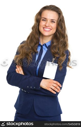 Smiling business woman with badge