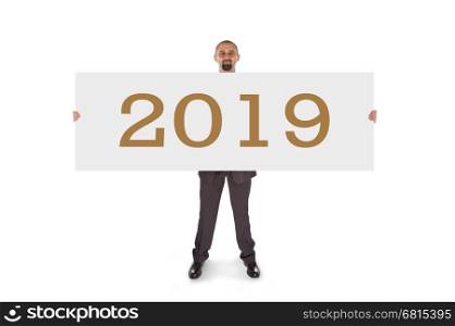 Smiling businessman holding a really big blank card - 2019, isolated on white