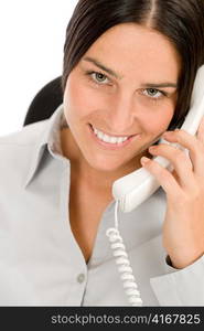 Smiling businesswoman attractive calling on phone close-up portrait