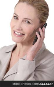 smiling businesswoman on the phone