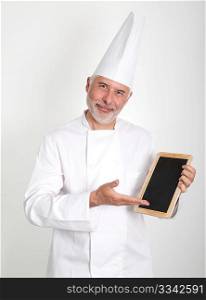 Smiling chef showing restaurant menu