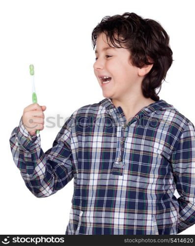 Smiling child with a toothbrush isolated on white background