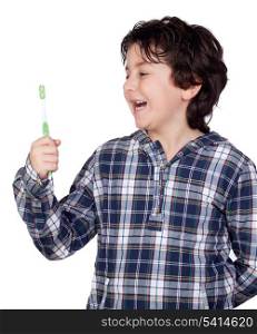Smiling child with a toothbrush isolated on white background