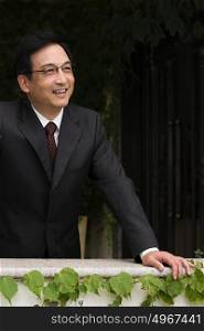 Smiling Chinese businessman