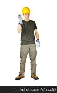 Smiling construction worker showing okay sign standing isolated on white background
