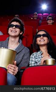 Smiling couple at cinema