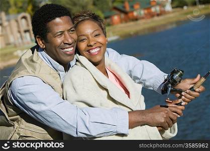 Smiling Couple Fishing Together