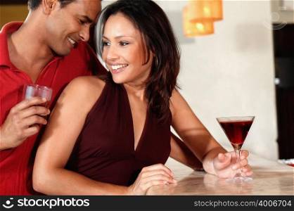 Smiling couple in bar