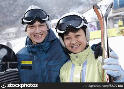 Smiling Couple in Ski Resort