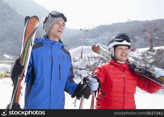 Smiling Couple in Ski Resort