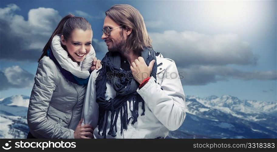 Smiling couple in the mountain
