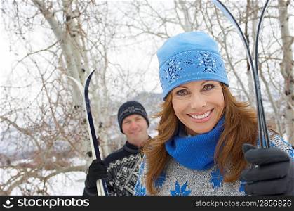 Smiling Couple with Cross-country Skis